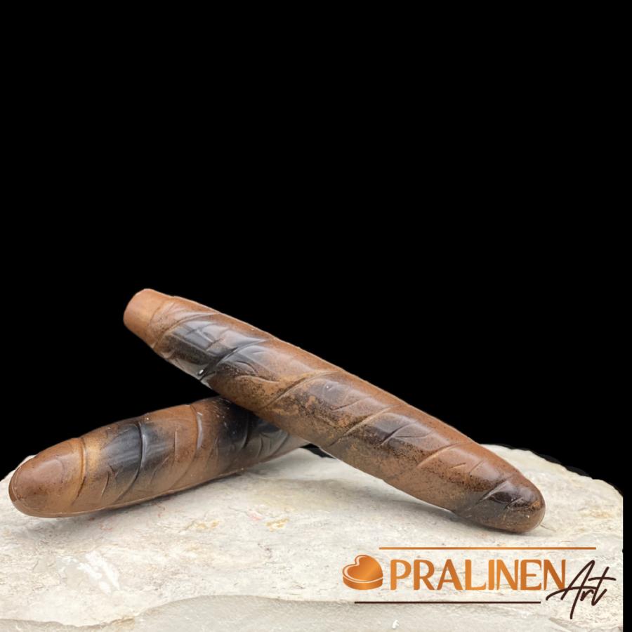 große Schokoladenzigarre von Pralinenart Belgische Schokolade gefüllt mit feinstem Giandujanougat aus Piemonteser Haselnüssen 