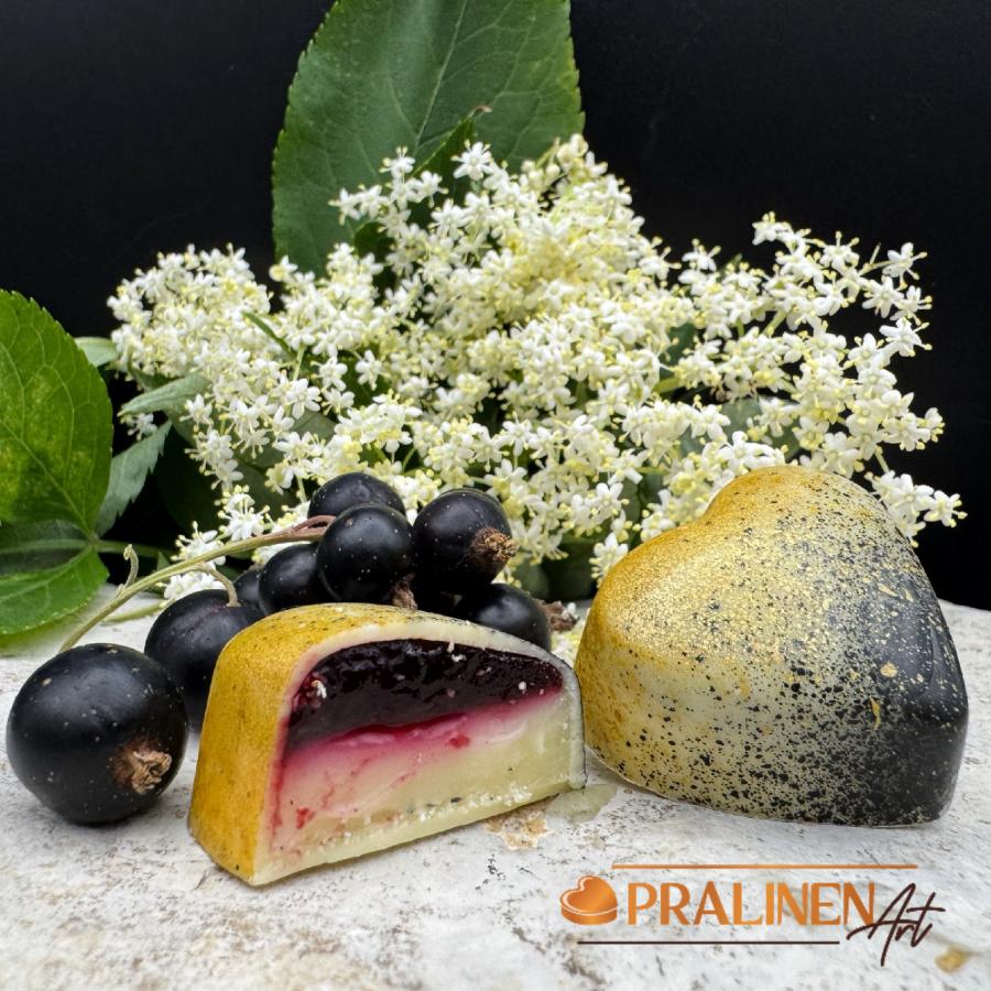 Black Hugo Pralinen, wei&szlig;e Schokolade mit Holunderbl&uuml;te & Johannisbeere | 4 St&uuml;ck