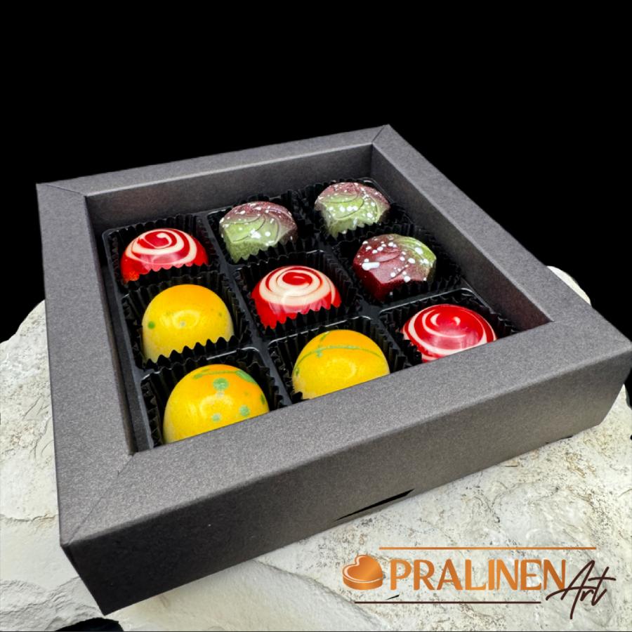 Edle handgefertigte Pralinen PralinenArt Kräuter Früchte Zauber Orange Basilikum Erdbeete mit frischer Minze Himbeere Rosmarin Tonkabohne